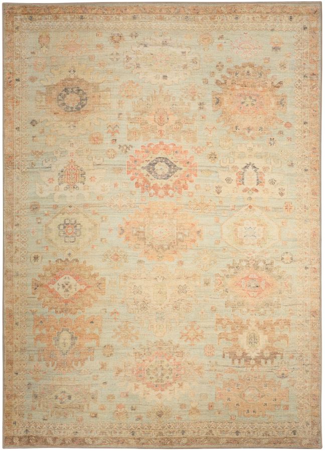 Vintage-inspired rug in soft green and peach
