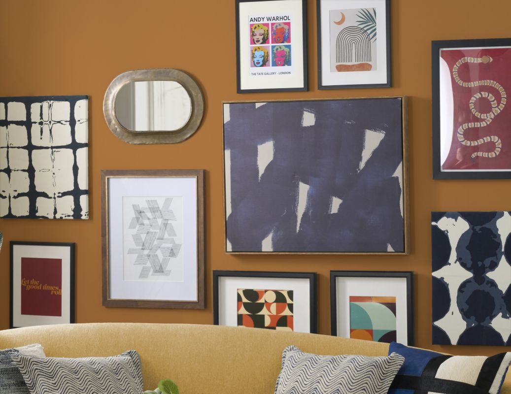 Gallery wall featuring mixed-pattern artwork