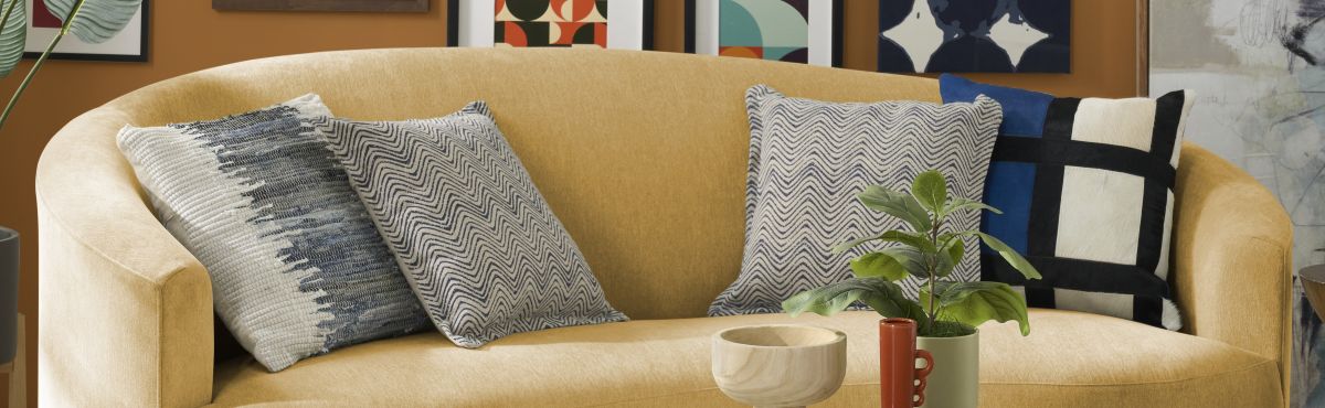 Close up image of textured and patterned pillows