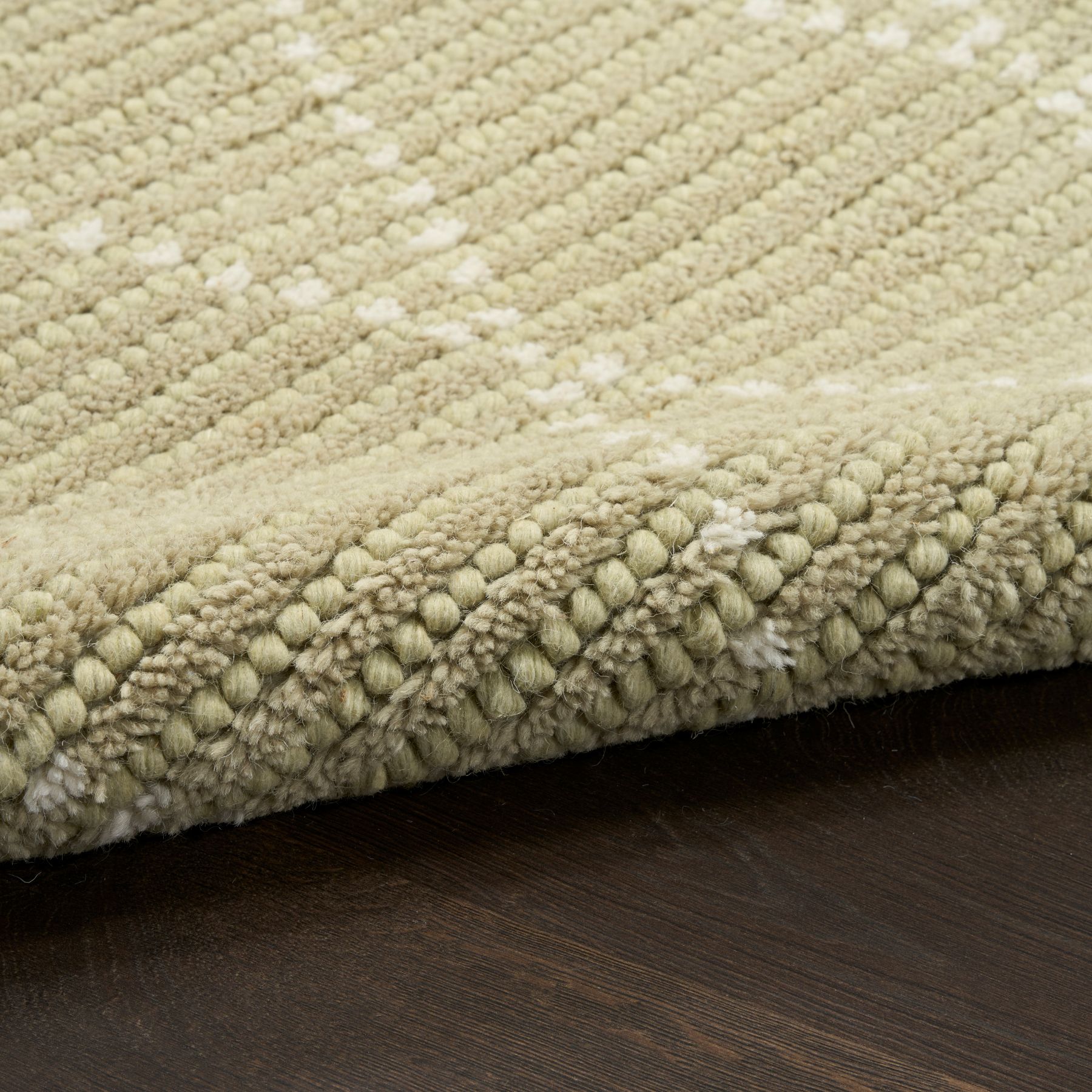 Closeup view of Azure AZU01 geometric wool blend rug in Sage Green