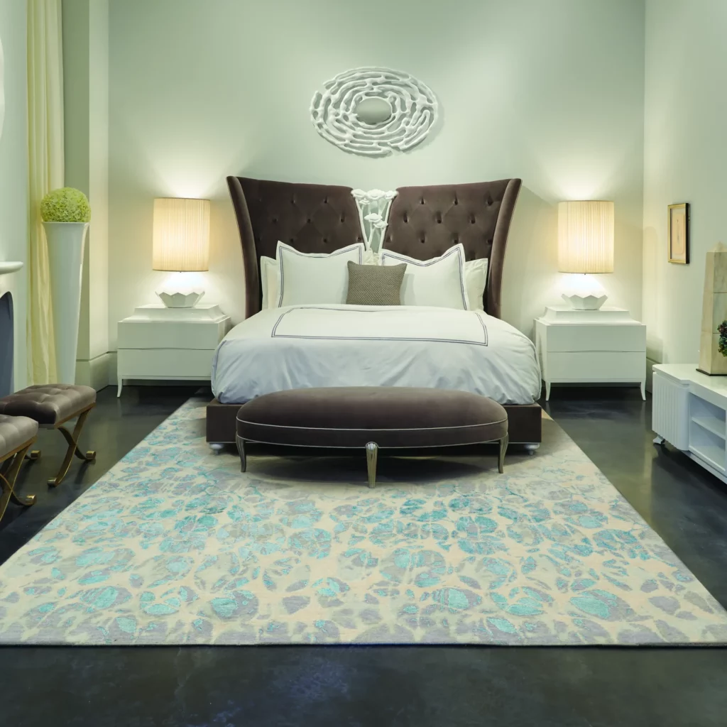 Christopher Guy CGS28 Birch area rug in a contemporary bedroom with dark tufted headboard, white bedding, and symmetrical nightstands